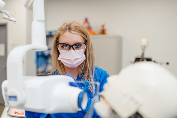 Female student in PPE